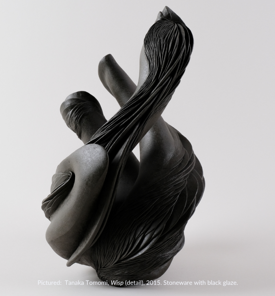a black ceramic abstract sculpture